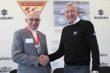 MotoGP race director Mike Webb inducts Hugh Anderson as an official MotoGP Legend